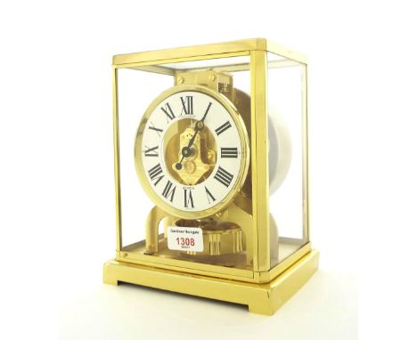 (401926-1-A) Jaeger-LeCoultre Classique Atmos clock, the 4.25" dial enclosing a skeletonised centre, within a glazed brass ca
