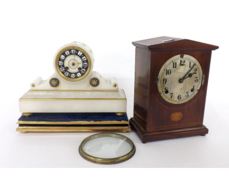 French onyx drumhead two train mantel clock striking on a bell, within a stepped fluted case and upon a gilt wooden stand, 10