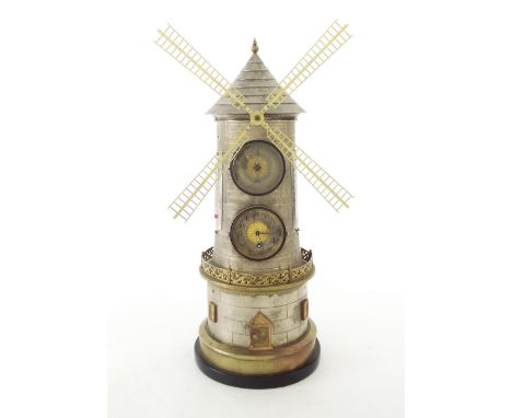 Novelty white metal and brass clock/barometer in the form of a windmill, the 2" silvered dials enclosing filigree gilt centre