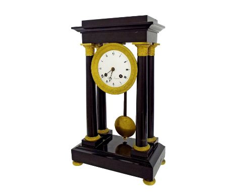 Good French black marble and ormolu mounted portico two train mantel clock, the movement with outside countwheel striking on 