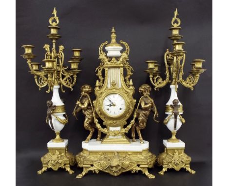 Reproduction French gilt metal and white stone two train mantel clock garniture, the movement with cylinder escapement striki