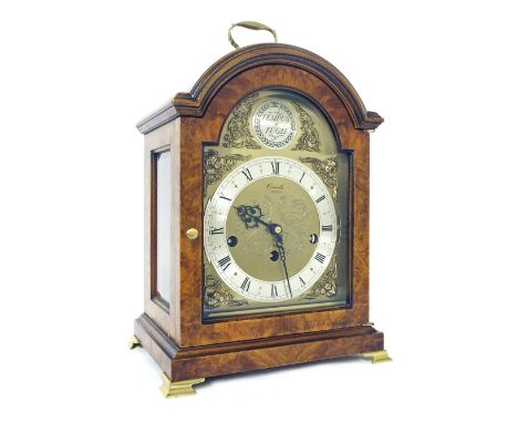 Good contemporary burr walnut small bracket clock, the 6" brass arched dial signed Comitti, London to the foliate engraved ce