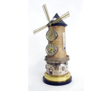 Good novelty copper and brass cased clock/barometer in the form of a windmill,  the two 2.25" silvered dials inset into a bri