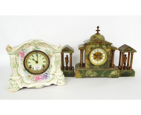 Ansonia two train mantel clock striking on a gong, within a royal Bonn painted pottery case, 11" high; also a green onyx two 