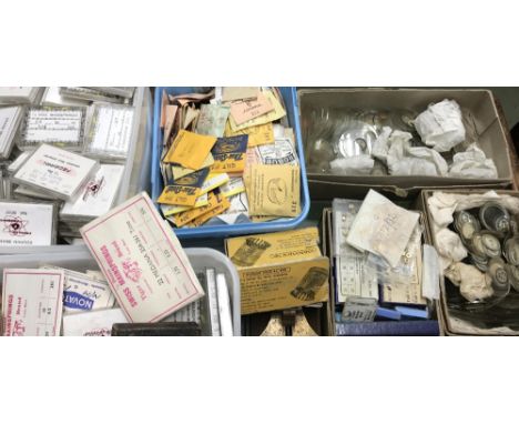 Assorted watch spares including a quantity of watch glasses, buttons, mainsprings, Bergeon-Vigor glassing tool, no. 4266 etc