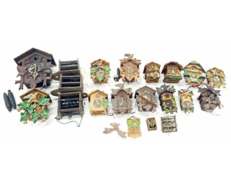 Old cuckoo clock, within a gabled case, 14" high (two weights, but missing cornice); also three old Black Forest movements an