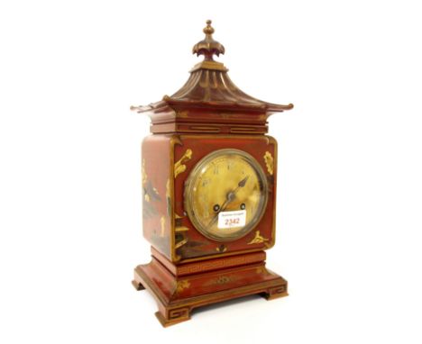 Attractive red lacquer two train pagoda mantel clock striking on a gong, 15" high (pendulum)