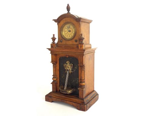 Walnut novelty automata mantel waterfall clock timepiece, within an architectural case, 13.25" high