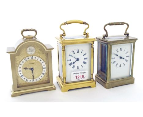 French carriage clock timepiece within a gilded pillared corniche style case, 6" high; also another French carriage timepiece