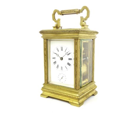 Margaine repeater alarm carriage clock striking on a gong, the back plate stamped with the maker's trademark logo, within an 