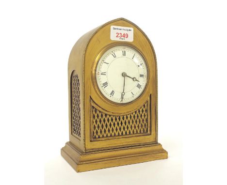 Brass lancet mantel clock timepiece within a diaper panelled and beaded case, 8.75" high