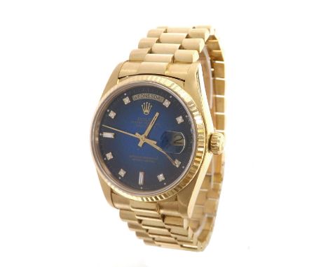 Rolex Oyster Perpetual Day-Date 18ct gentleman's bracelet watch, ref. 18038, serial no. 8xxxxxx, circa 1984/85, blue dial wit