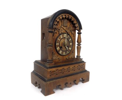 Black Forest cuckoo clock in need of restoration, the 5.5" dial within a pillared rounded arched stepped case with ebony bord