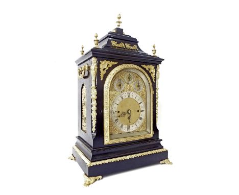 English ebonised and ormolu mounted triple fusee boardroom clock, the 7.5" brass arched dial with silvered chapter ring enclo
