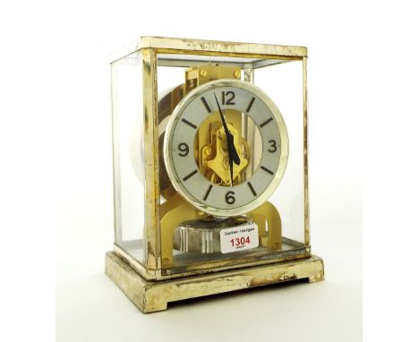 Jaeger-LeCoultre Atmos clock, the 4" silvered chapter ring enclosing a skeletonised centre, within a chrome bound glazed case