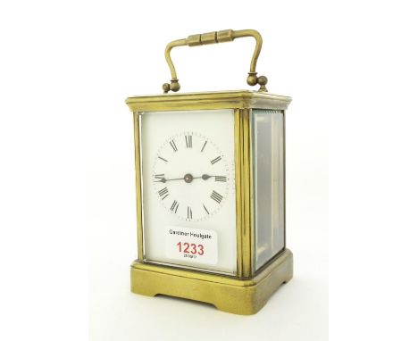 Carriage clock timepiece bearing the Richard & Co trademark logo stamped on the back plate, within a corniche brass case, 7" 