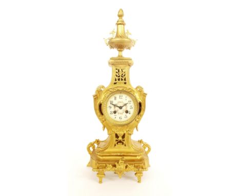 French gilt metal two train ornate mantel clock striking on a bell, 22.25" high (pendulum)