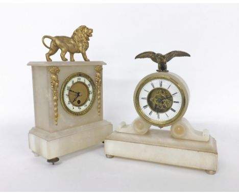 Two French white onyx mantel clock timepieces, 14" high and 11" high respectively (two pendulums)