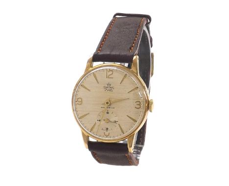 Smiths De Luxe 9ct gentleman's wristwatch, London 1964, circular silvered dial with gilt quarter Arabic numerals and baton ma