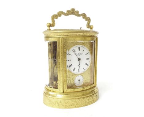 Good oval repeater alarm carriage clock striking on a bell, the 2" white dial signed Nicolo Nielson & Co, 11 Soho Square, Lon