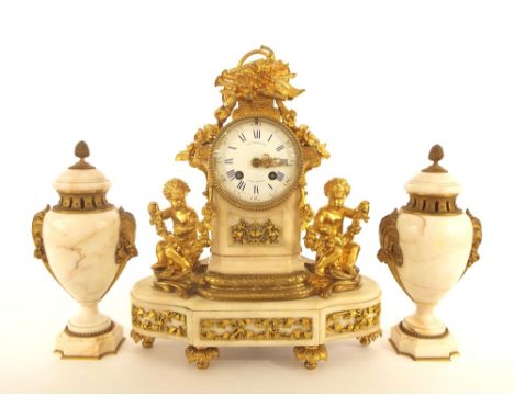 French ormolu and white marble two train mantel clock garniture striking on a bell, the 3.5" white dial signed Charles Taylor