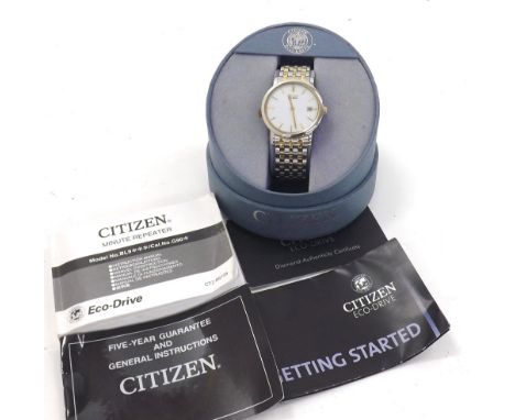 Citizen Eco-Drive stainless steel and gold gentleman's bracelet watch, circular white dial with baton markers and date apertu