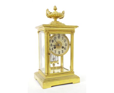 French brass four glass two train mantel clock, the Vincenti movement stamped S.F. Paris and striking on a gong, the 3" silve