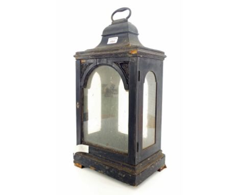 Early ebonised bracket clock case in need of restoration, with aperture for a 7" arched dial, with caddy top and brass carryi