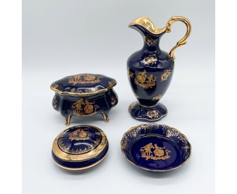 Exquisite Limoges porcelain vanity set featuring a rich cobalt blue glaze adorned with intricate 24-karat gold gilt embellish