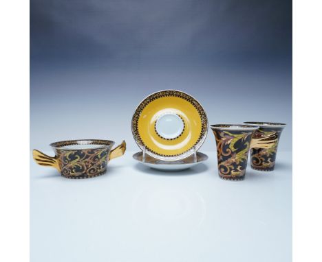 An elegant Rosenthal Versace Barocco porcelain set, featuring the iconic baroque-inspired design with lavish gold accents. Th