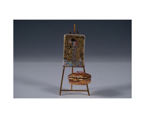 Hand-painted Limoges porcelain figurine box designed as an artists easel, featuring a miniature painting inspired by Gustav K
