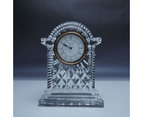 Elegant Waterford Crystal Lismore carriage clock featuring the brand's signature deep diamond and wedge cuts. This fine cryst