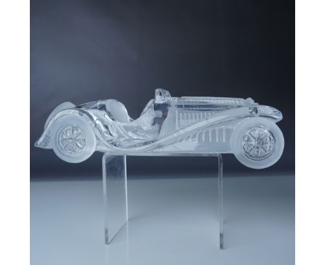 Designed by Xavier Froissart in 1987, this exquisite Daum France crystal sculpture captures the elegance of the iconic 1931 B