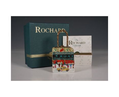 Exquisite Rochard Limoges porcelain trinket box in the shape of a handbag, featuring a festive hand-painted depiction of Bloo