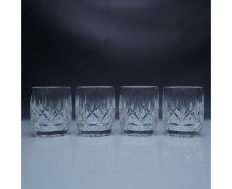 A set of four Waterford Crystal Westhampton Double Old Fashioned glasses, featuring an elegant cut design with a faceted base