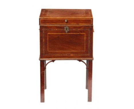 A GEORGE III MAHOGANY, ROSEWOOD AND LINE INLAID CELLARET, C1800   with brass handles, lead lined, 67cm h; 26 x 39cm++Veneer s