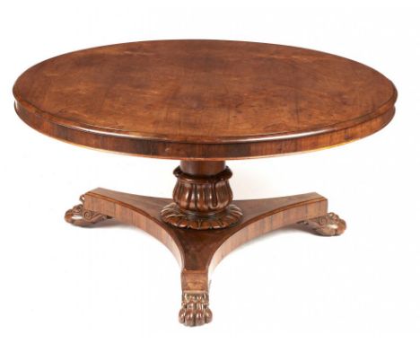 A WILLIAM IV ROSEWOOD BREAKFAST TABLE, C1830 with lappeted pillar, platform and carved paw feet, 73cm h, 151cm diam ++Good un