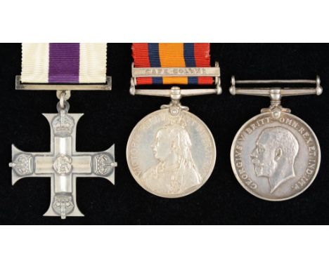 ANGLO BOER WAR  AND WORLD WAR ONE M C GROUP OF THREE  Military Cross, unnamed, case of issue, Queen's South Africa Medal one 