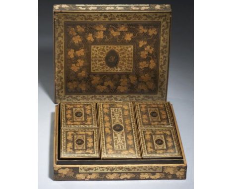 A CHINESE EXPORT BLACK AND GOLD LACQUER GAMES BOX AND COVER, QING DYNASTY, EARLY 19TH C  the interior retaining the five smal