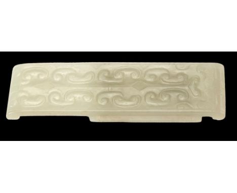 A CHINESE FINELY CARVED PALE TRANSLUCENT JADE SCABBARD SLIDE, 19TH/EARLY 20TH C   with two rows of scrolls and taotie face at