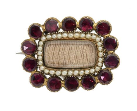 A VICTORIAN GARNET AND SPLIT PEARL MOURNING BROOCH, C 1840 in gold, the centre inset with hair, 30 x 23mm, 7.3g++Good conditi
