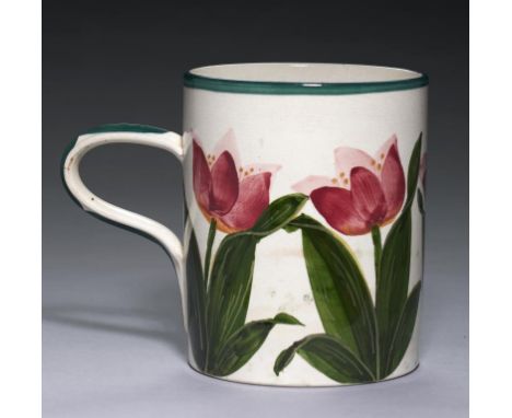 A WEMYSS WARE MUG, C1900  painted with red tulips, 14cm high, impressed semi circular mark,  R H & S Wemyss Ware++In good con