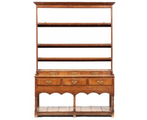 A GEORGE III OAK DRESSER, FIRST HALF 19TH C  on turned forelegs with pot board and a rack, 202cm h; 42 x 139cm (2)++Some repa