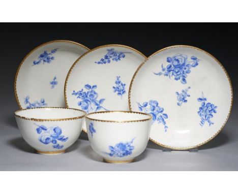 TWO SÈVRES TEA BOWLS AND THREE SAUCERS (TASSES A THE ET SOUCOUPES), 1765-1769 & CIRCA painted with flowers, two tea bowls and