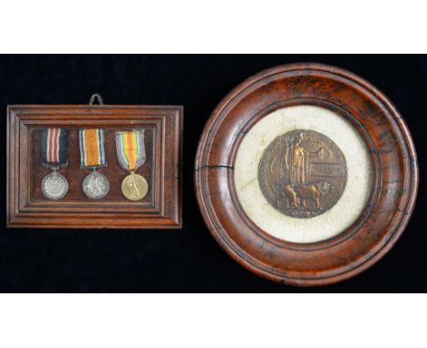 WORLD WAR ONE M M GROUP OF THREE AND PLAQUE  Military Medal, British War Medal and Victory Medal 95067 L CPL F C GRINDLEY 13/