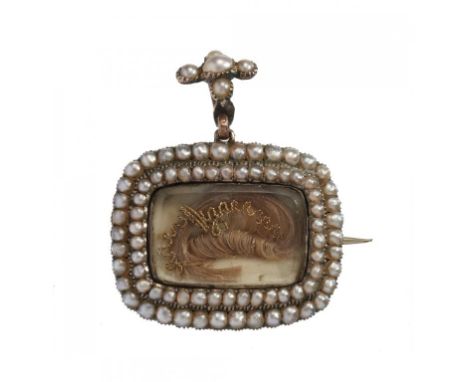 A SPLIT PEARL MOURNING BROOCH, EARLY 19TH C in gold, centre inset with hair and gold wire, the reverse engraved R.M.J. 1909, 