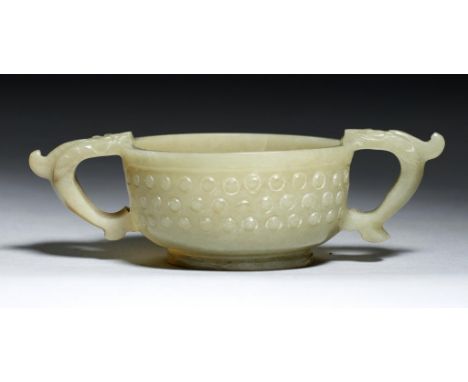 A CHINESE ARCHAIC STYLE JADE CUP,  19TH/EARLY 20TH C  12cm over handlesProvenance: Malcolm Sinclair (1876-1939) by whom acqui