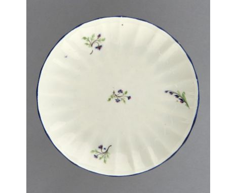 A PINXTON FLUTED SAUCER DISH, 1796-1813   pattern 14, enamelled in blue and green with pink accents with sprigs, blue enamel 