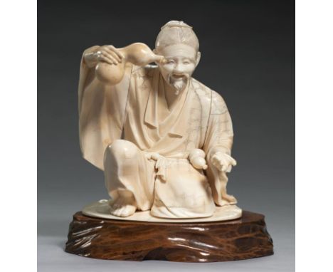 A JAPANESE SECTIONAL IVORY OKIMONO OF A CROUCHING MAN HOLDING A GOURD FLASK, MEIJI PERIOD 14.5cm h, signed Noritaka (Sokuryo)