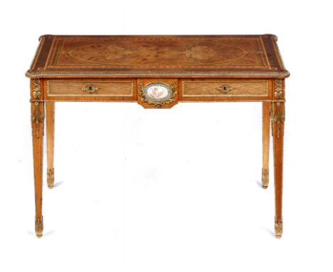 A VICTORIAN GILT BRASS MOUNTED KINGWOOD, TULIPWOOD AND  MARQUETRY WRITING TABLE  in Louis XVI style, c1860 the top in matched